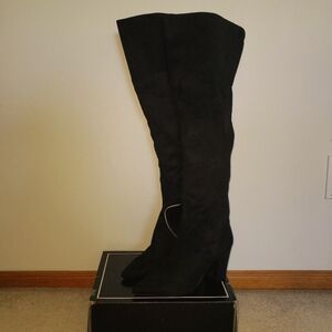 Thigh high Jessica Simpson heel boots.